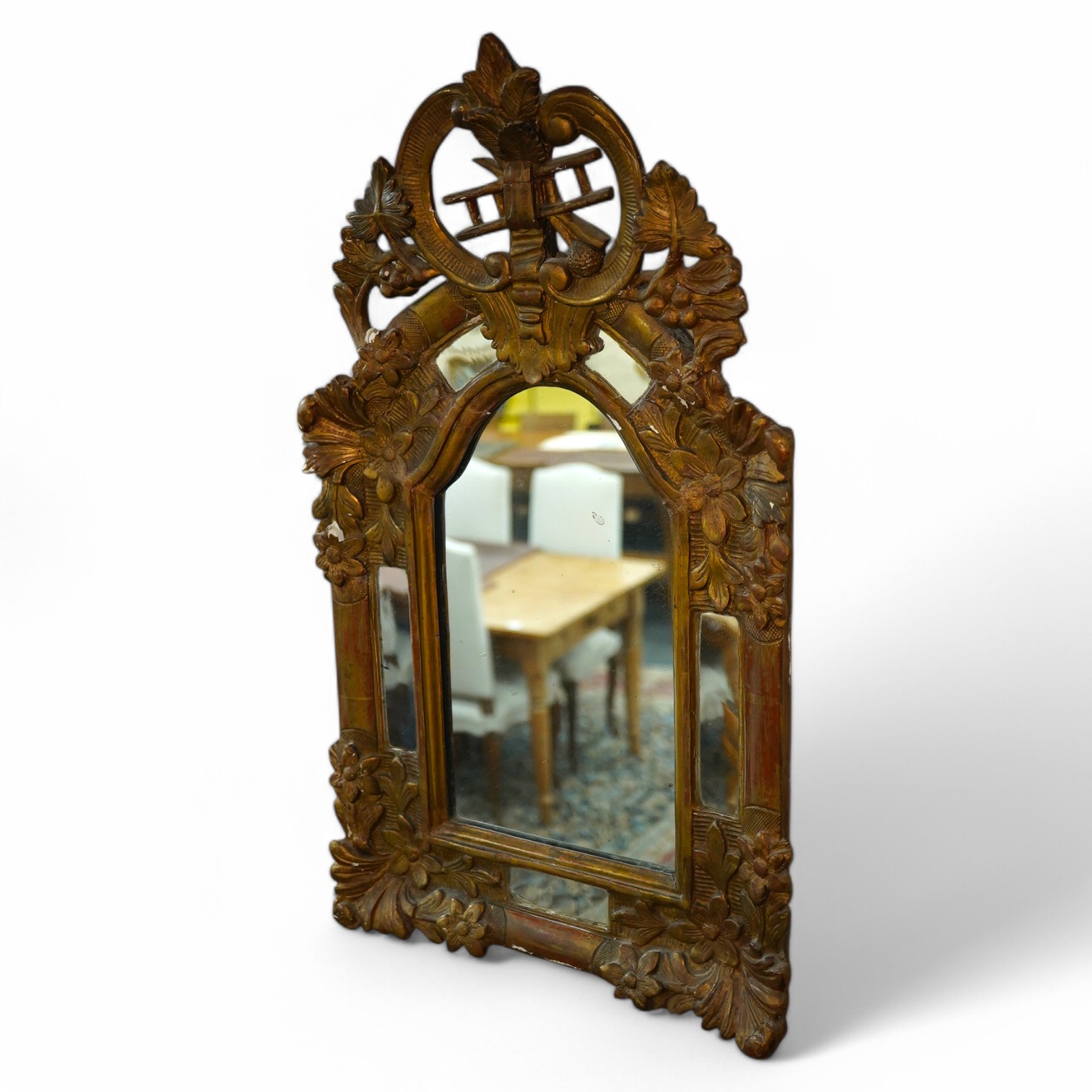 A Victorian gilt gesso mirror with chimney sweep's guild crest. Condition - poor to fair